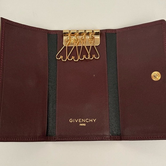 Givenchy 4 Key Holder. Color is of dark red  / brown - Picture 3 of 6